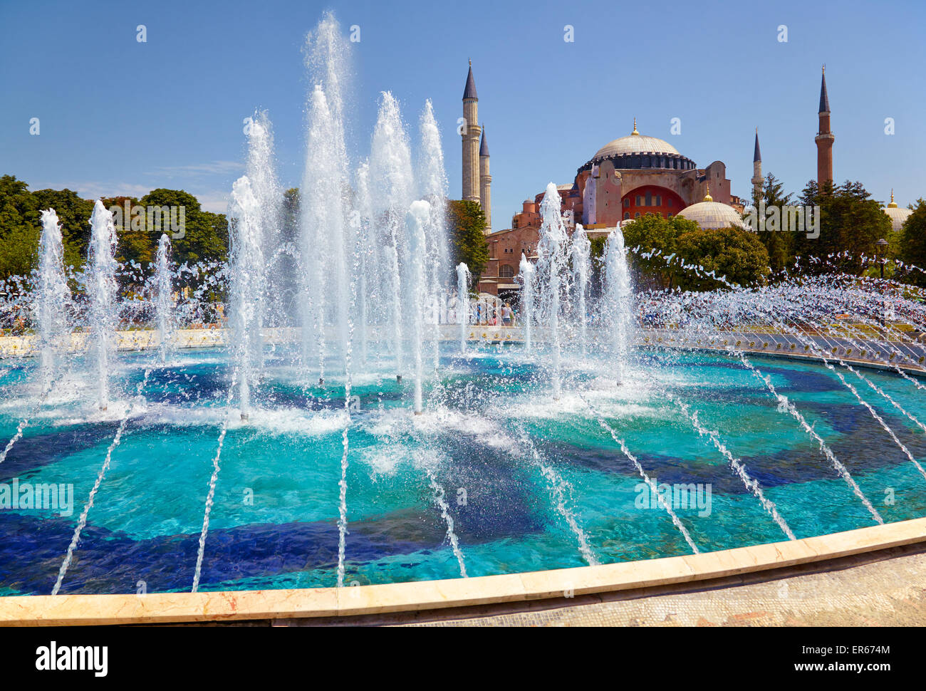 The view of fountain in Sultan Ahmet Park with Hagia Sophia in the ...