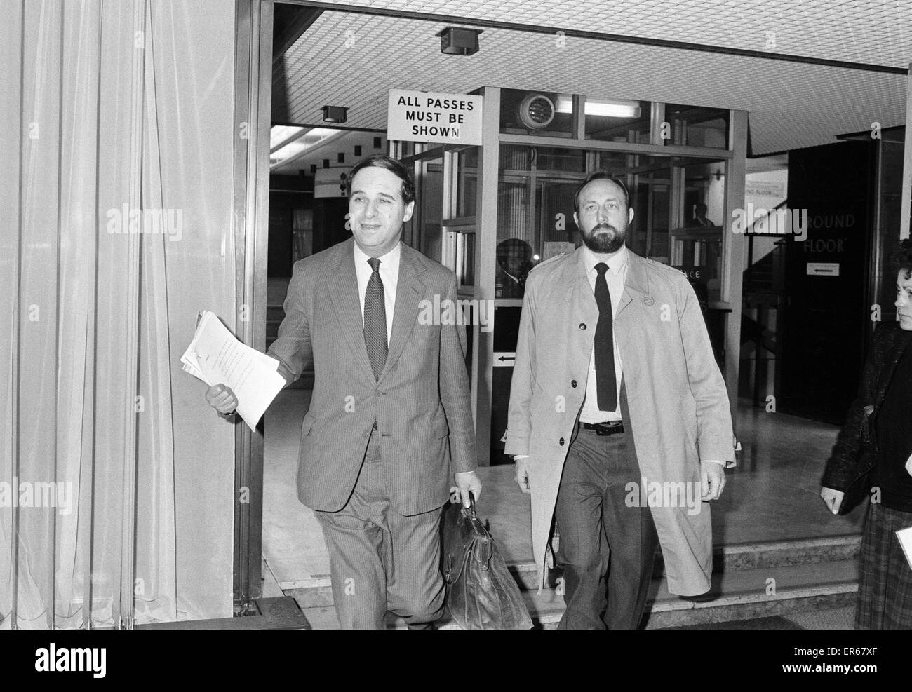 Conservative Cabinet Minister  Leon Brittan leaving the Department of Trade and Industry on his way to the House of Commons to hear Prime Minister Margaret Thatcher's speech on the Westland affair. 16th January 1986. Stock Photo