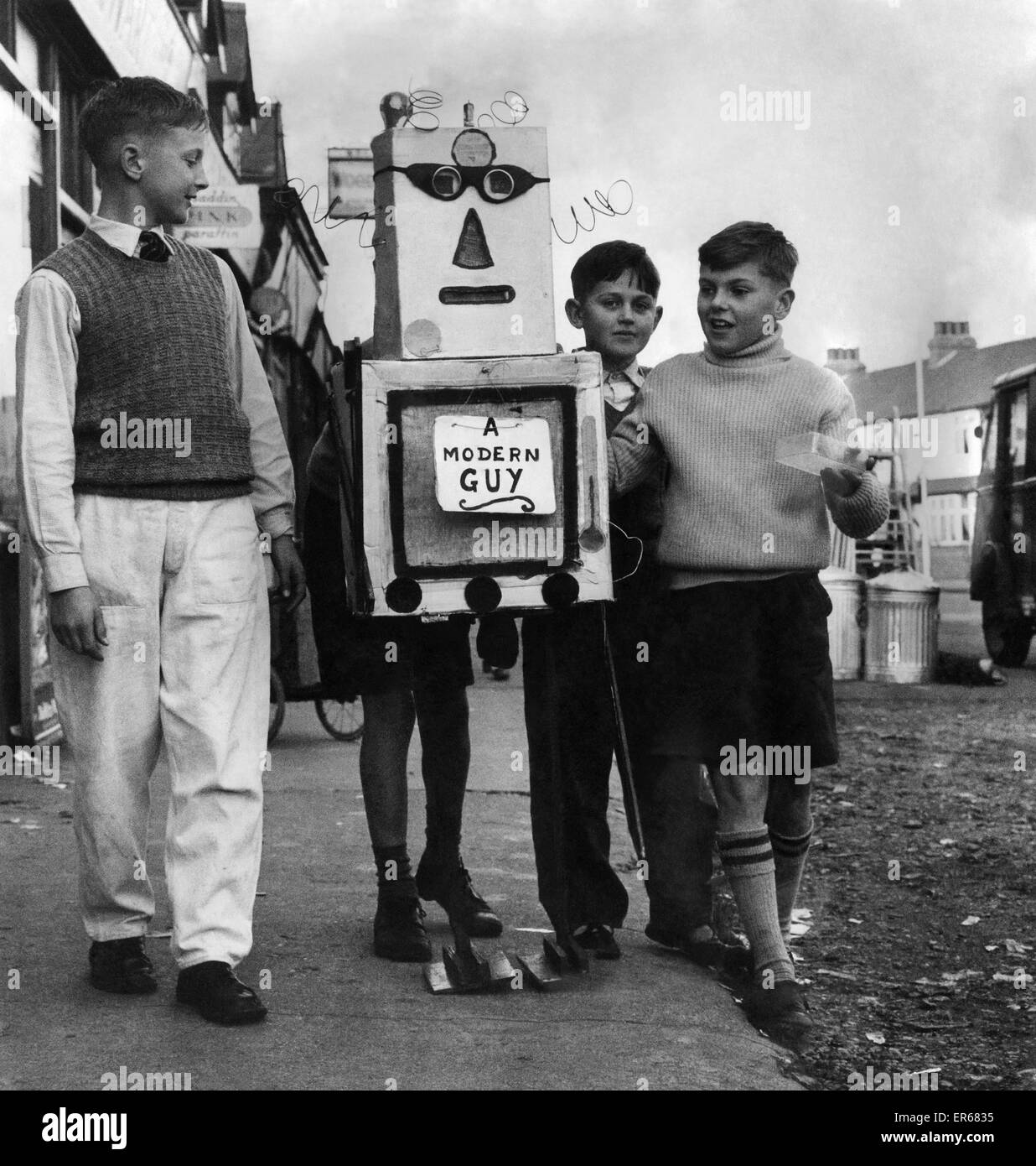 A Different Guy: Twelve year old Terry Walker of Hayes, Middlesex, is a lad with ideas. He thinks that the usual fashioned Guy should be brought up to date, and here is his modern Guy which Terry can propel along the street. When anyone subscribes to "Guy Stock Photo