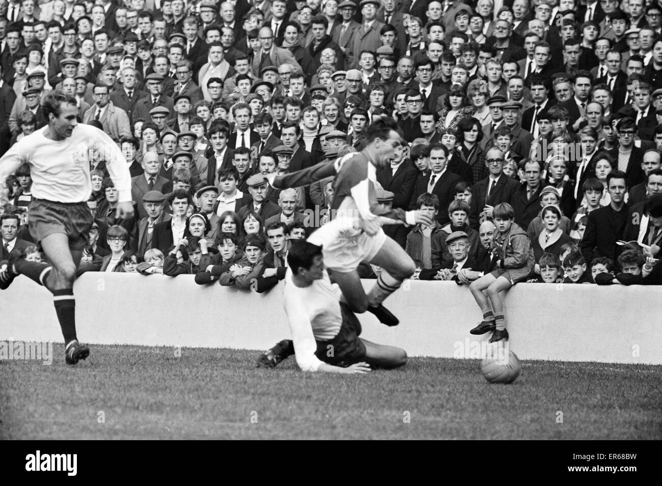 English League Division Two match at Ewood Park. Blackburn Rovers 2 v Bury 1. Blackburn's Bryan Douglas about to hit the ground after a tackle from Colquhon of Bury. 8th October 1966. Stock Photo