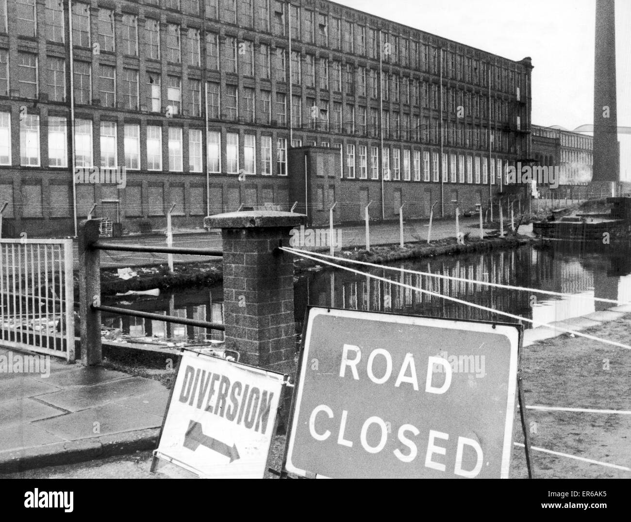 Murder scene, near canal in Poplar Street, Failsworth where murder victim Sharon Mosoph was found. The area is signed and roped off, and in the background is the convertd mill building where Sharon Mosoph worked, pictured 9th March 1976.  Trevor Joseph Ha Stock Photo