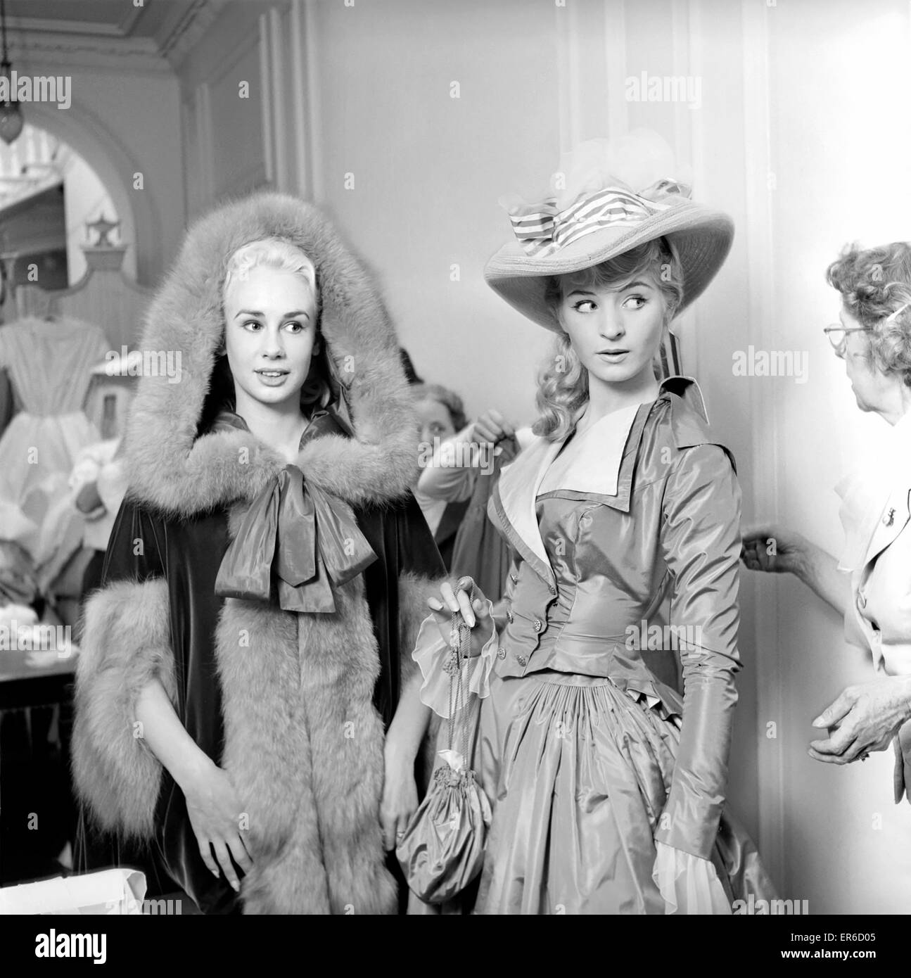 Actresses and models take part in a 18th century fashion parade at Pinewood Studios. July 1957 A476-001 Stock Photo