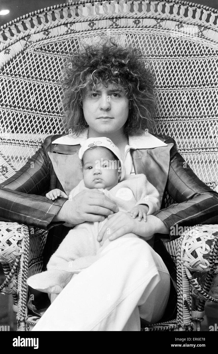 Marc Bolan with girlfriend Gloria Jones and their baby son, Rolan Bolan - born 26th September 1975 - pictured 8th January 1976. Stock Photo