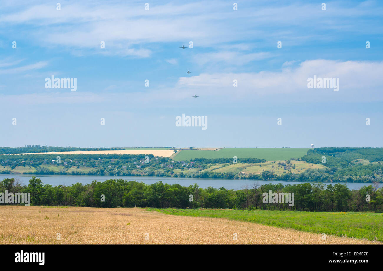 Summer landscape with phases of an airplane take-off Stock Photo