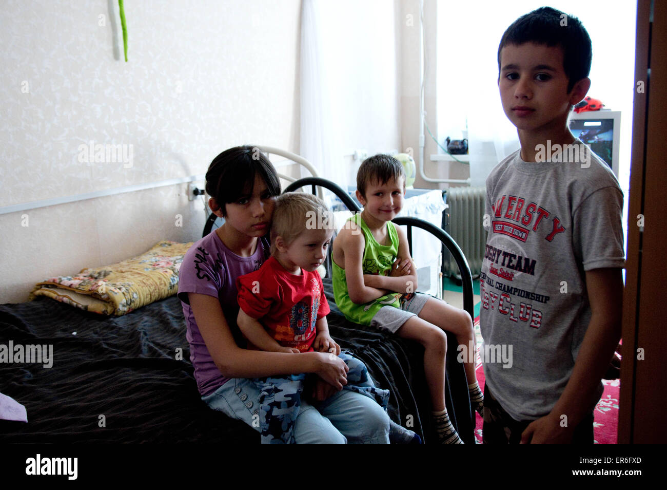 Llovaysk, Ukraine. 26th May, 2015. Displaced children living in refugee center run by volunteers. The conflict in eastern Ukraine has caused more than 6000 deaths, although the Minsk agreement has been signed in February but regular fighting still take place in the conflict zone on daily basis. © Geovien So/Pacific Press/Alamy Live News Stock Photo