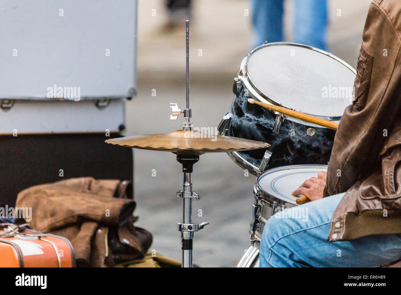 Street drummer playing music in a sunny day drums, cymbals and drumsticks Stock Photo Alamy