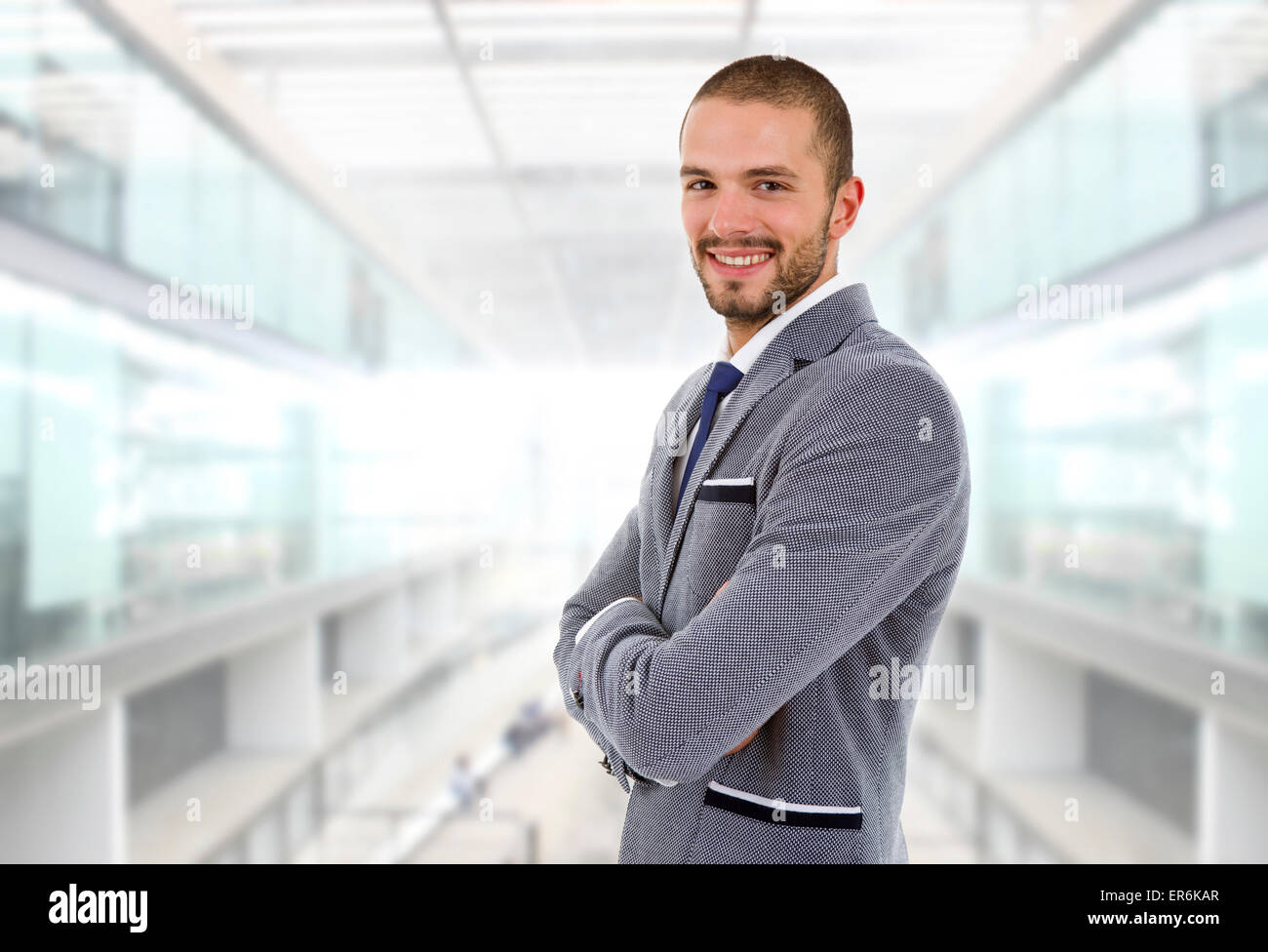 young happy businessman portrait at the office Stock Photo - Alamy