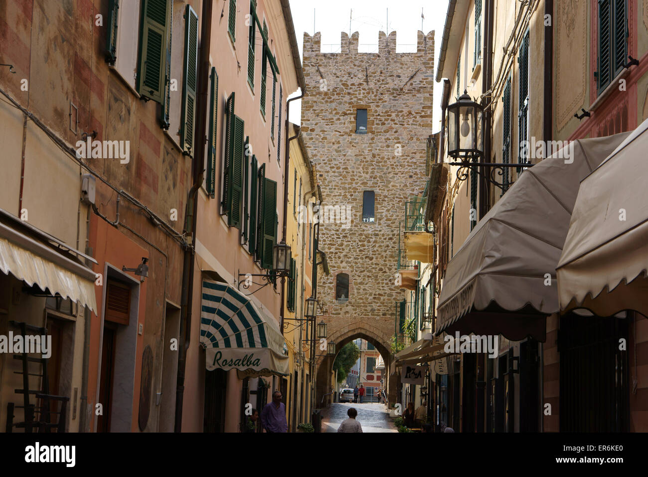 Narrow xstreet and tower, Noli, Riviera di Ponente, Liguria, Italy Stock Photo