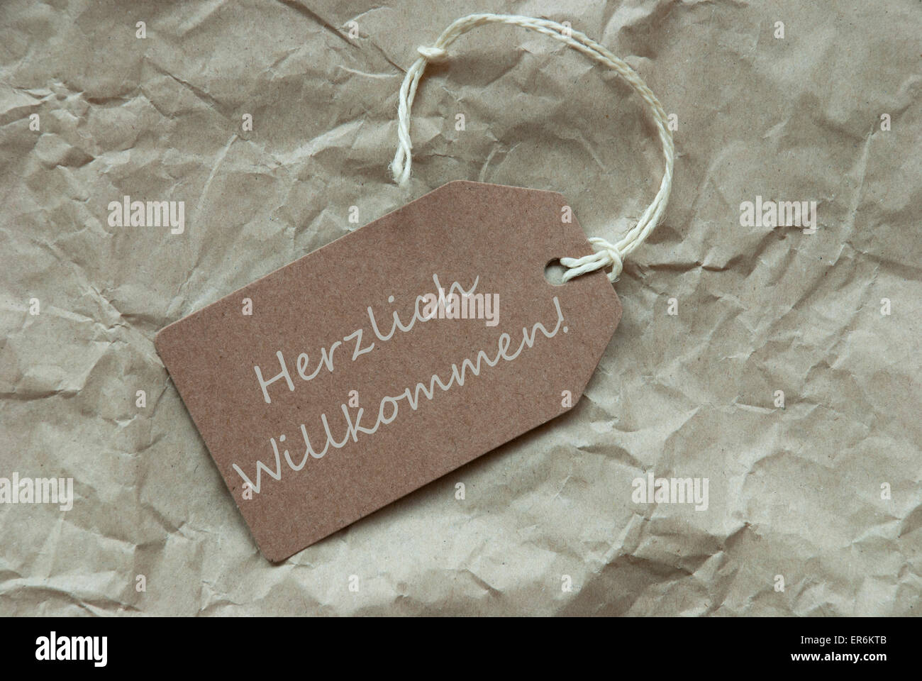 Beige Label Herzlich Willkommen Means Welcome Stock Photo