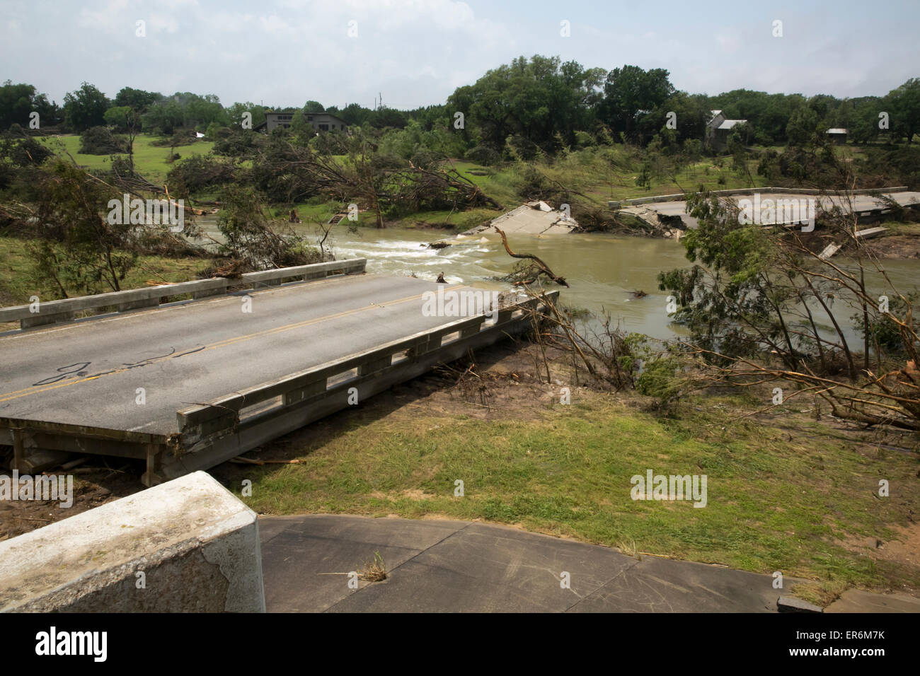 Wimberley, Texas, USA. 27th May, 2015. The Fischer Store Road bridge in Wimberley, Texas destroyed by floodwaters from the Blanc Stock Photo