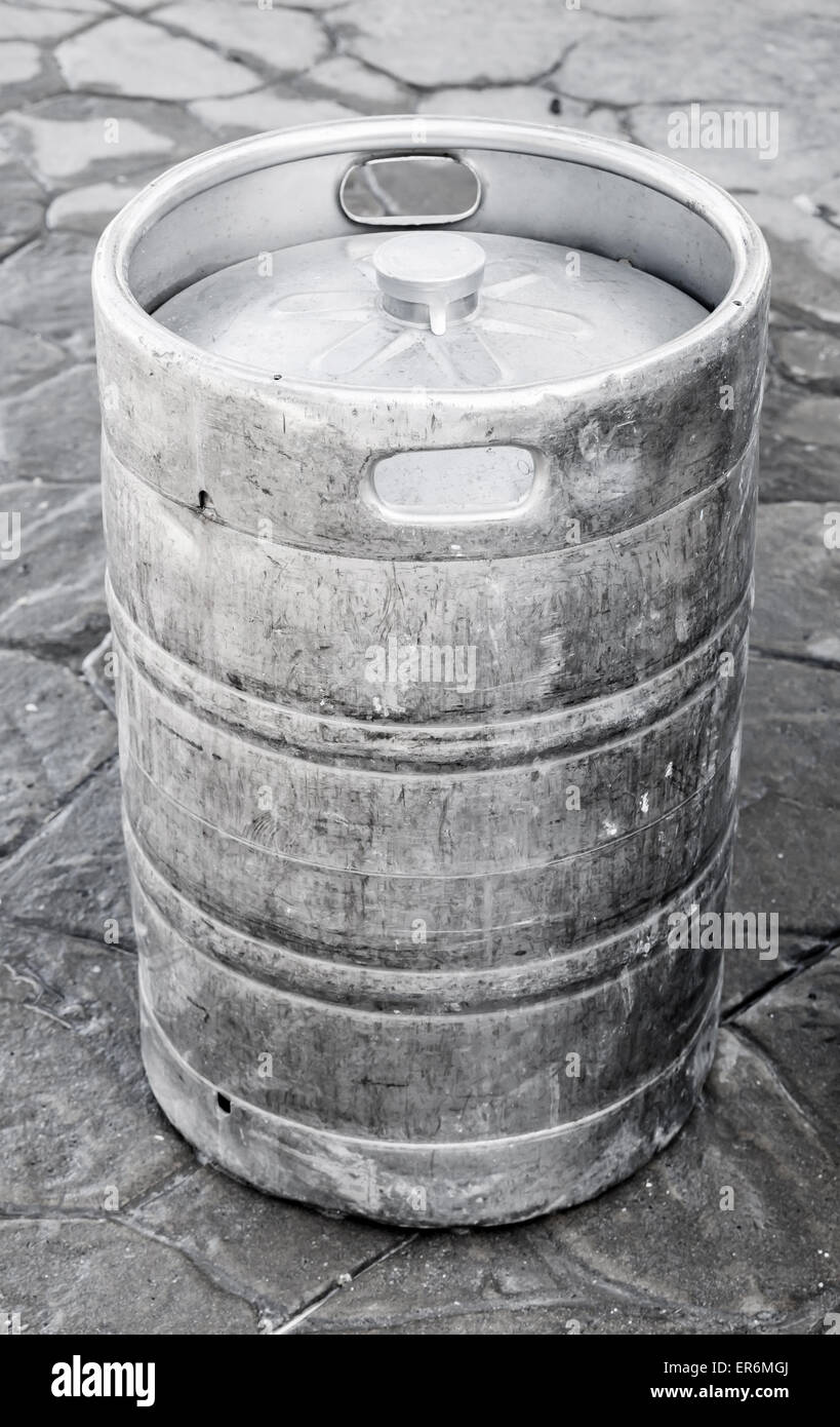 Used aluminum keg, small barrel commonly used to store, transport, and serve beer Stock Photo
