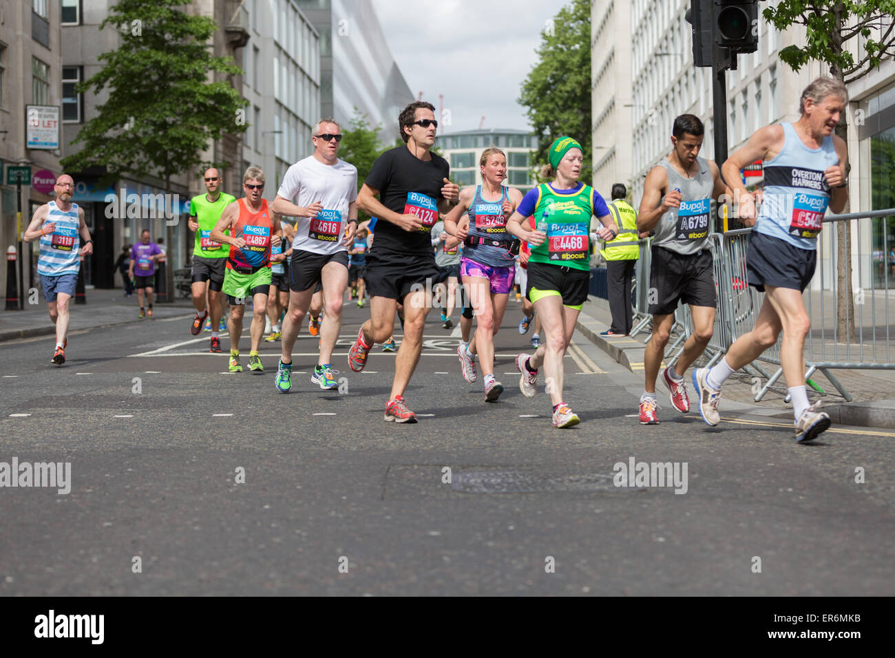 Competitors running at the Bupa London 10,000 run on Monday 25th May 2015 Stock Photo