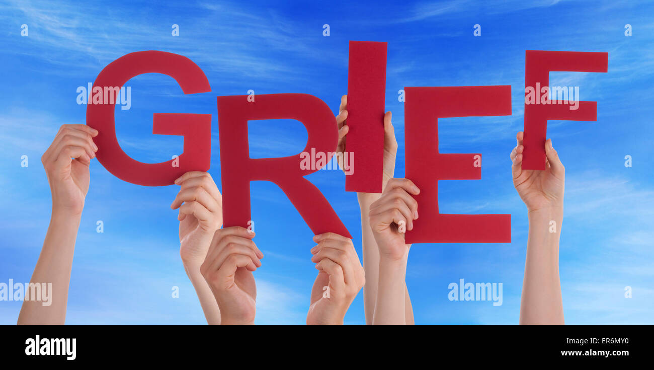 Many People Hands Holding Red Word Grief Blue Sky Stock Photo Alamy