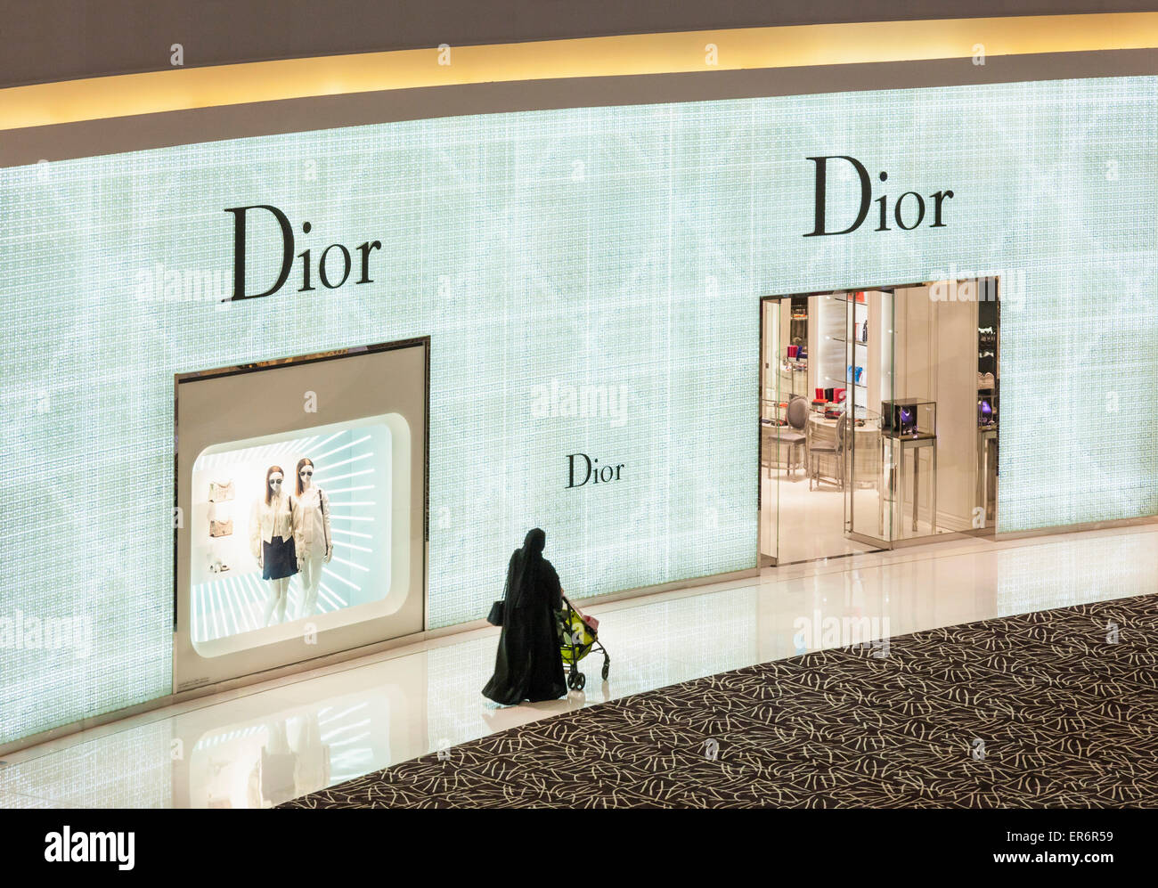 Arab shopper outside Christian Dior Shop Dubai Mall Dubai City United Arab Emirates UAE Middle east Stock Photo