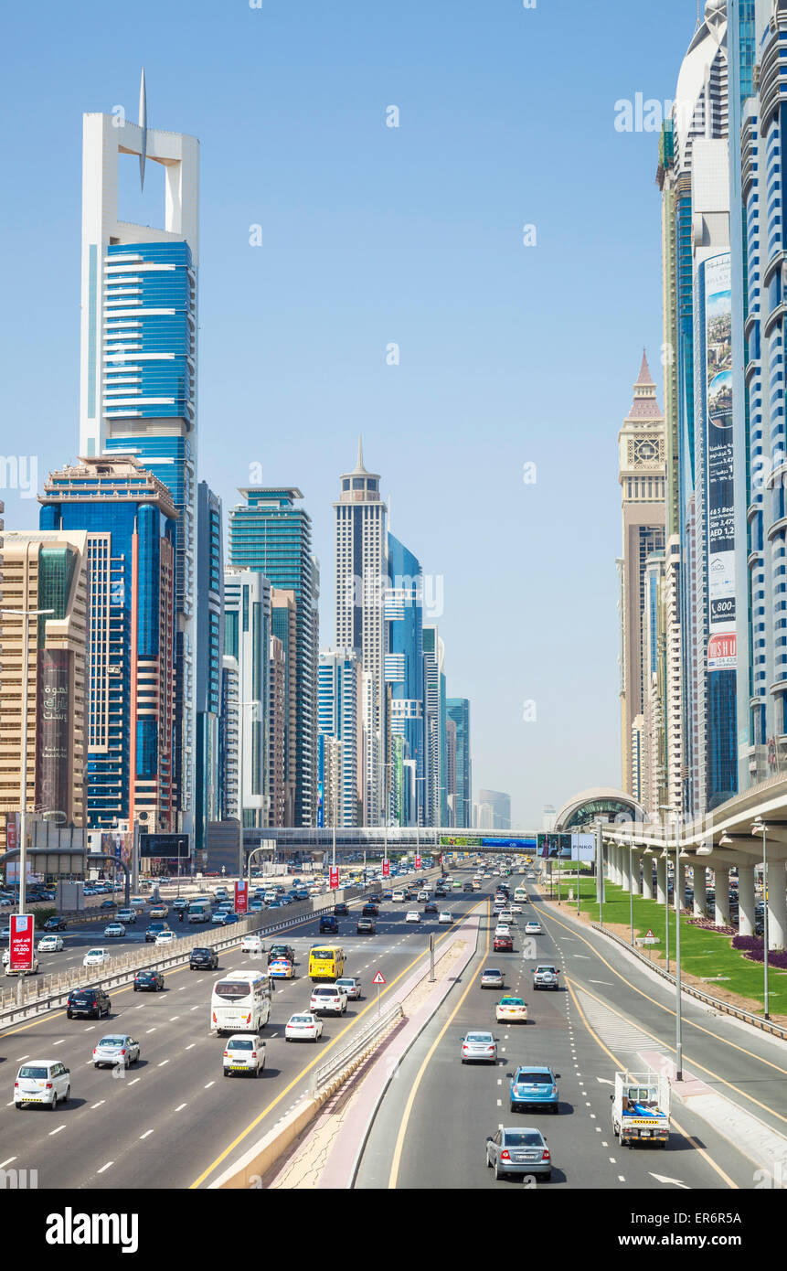 Sheikh Zayed Road traffic and Dubai Skyline Dubai City United Arab Emirates UAE Middle east Stock Photo