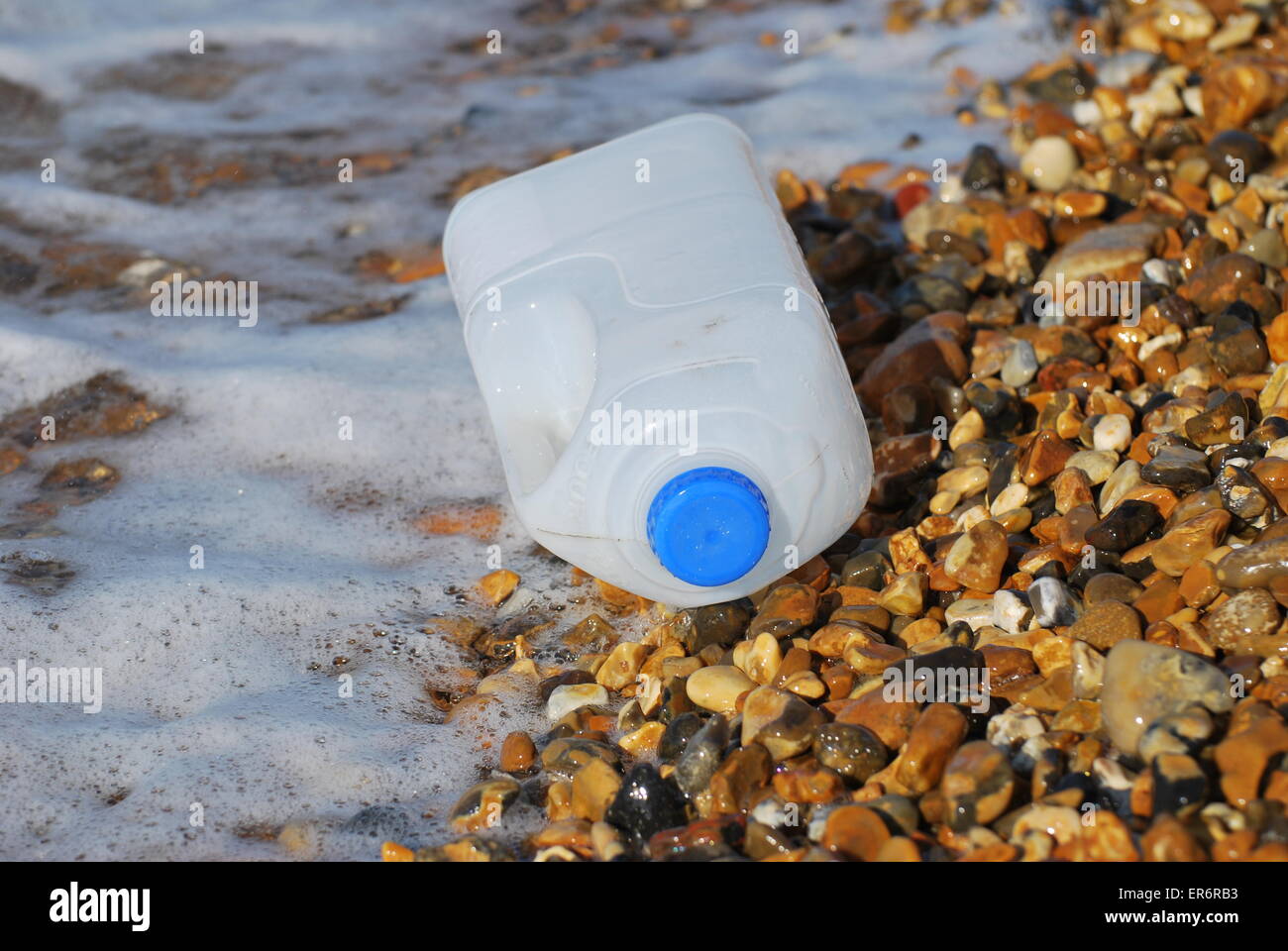Bottle washed up on a beach near Bournemouth, UK Stock Photo