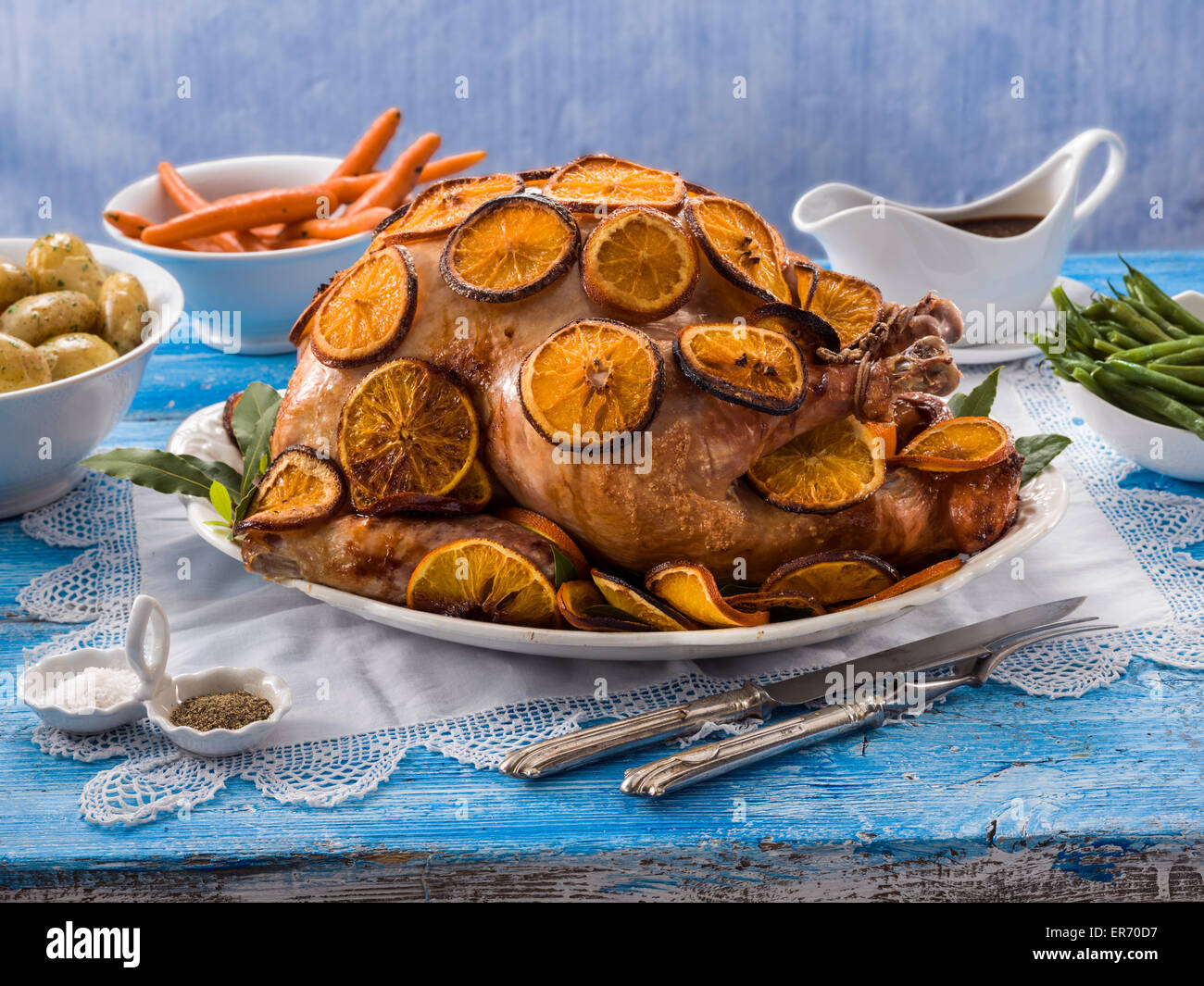 Whole Turkey orange glazed with orange slices Stock Photo