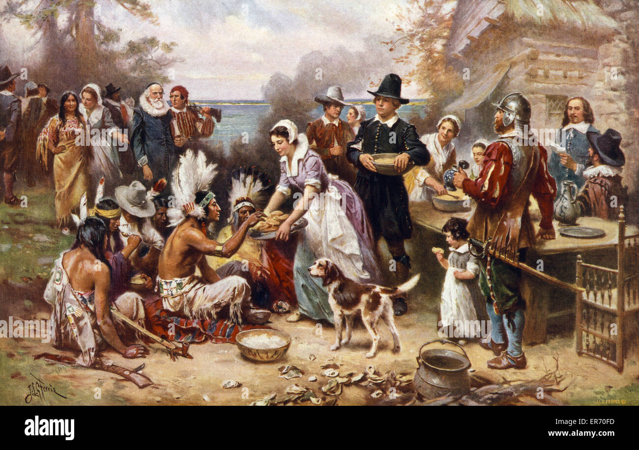 The first Thanksgiving 1621. Pilgrims and Natives gather to share meal. Date c1932. Stock Photo