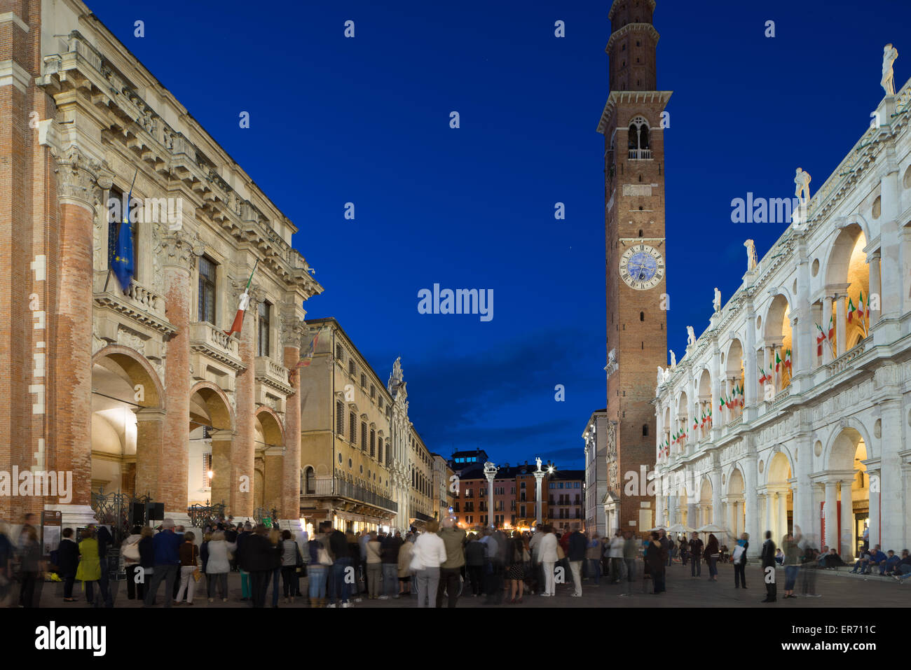 The Torre Bissara and Basilica Palladiana in the Piazza dei Signori in Vicenza Italy. View at night. Stock Photo
