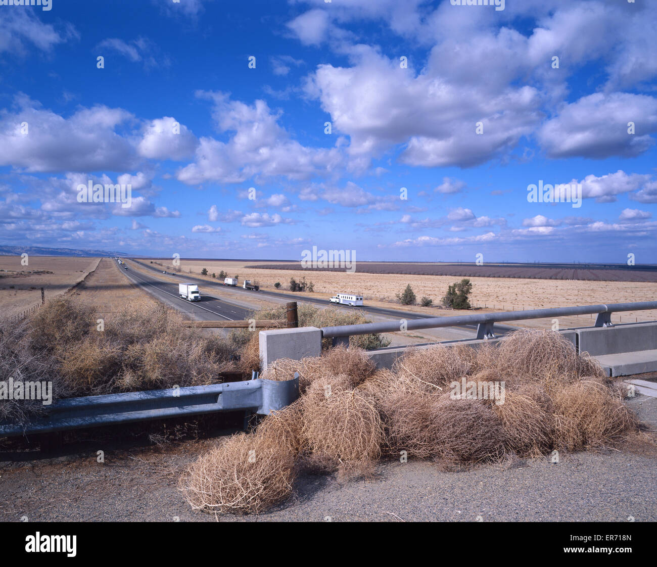 Highway overpass with tumbleweeds Stock Photo