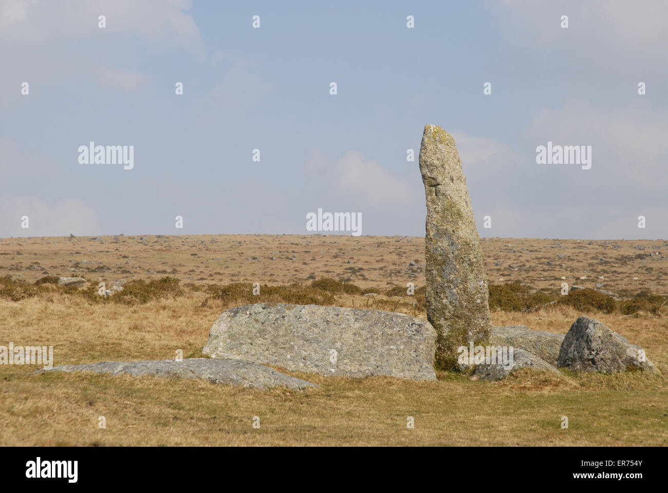 Standing stone way marker in empty, bleak landscape near merrivale, Dartmoor National Park, Devon, England Stock Photo