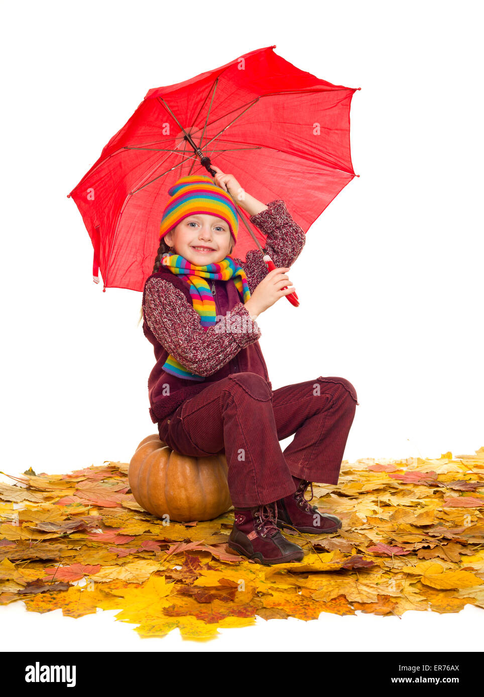 girl with umbrella on autumn leaves studio shoot Stock Photo - Alamy