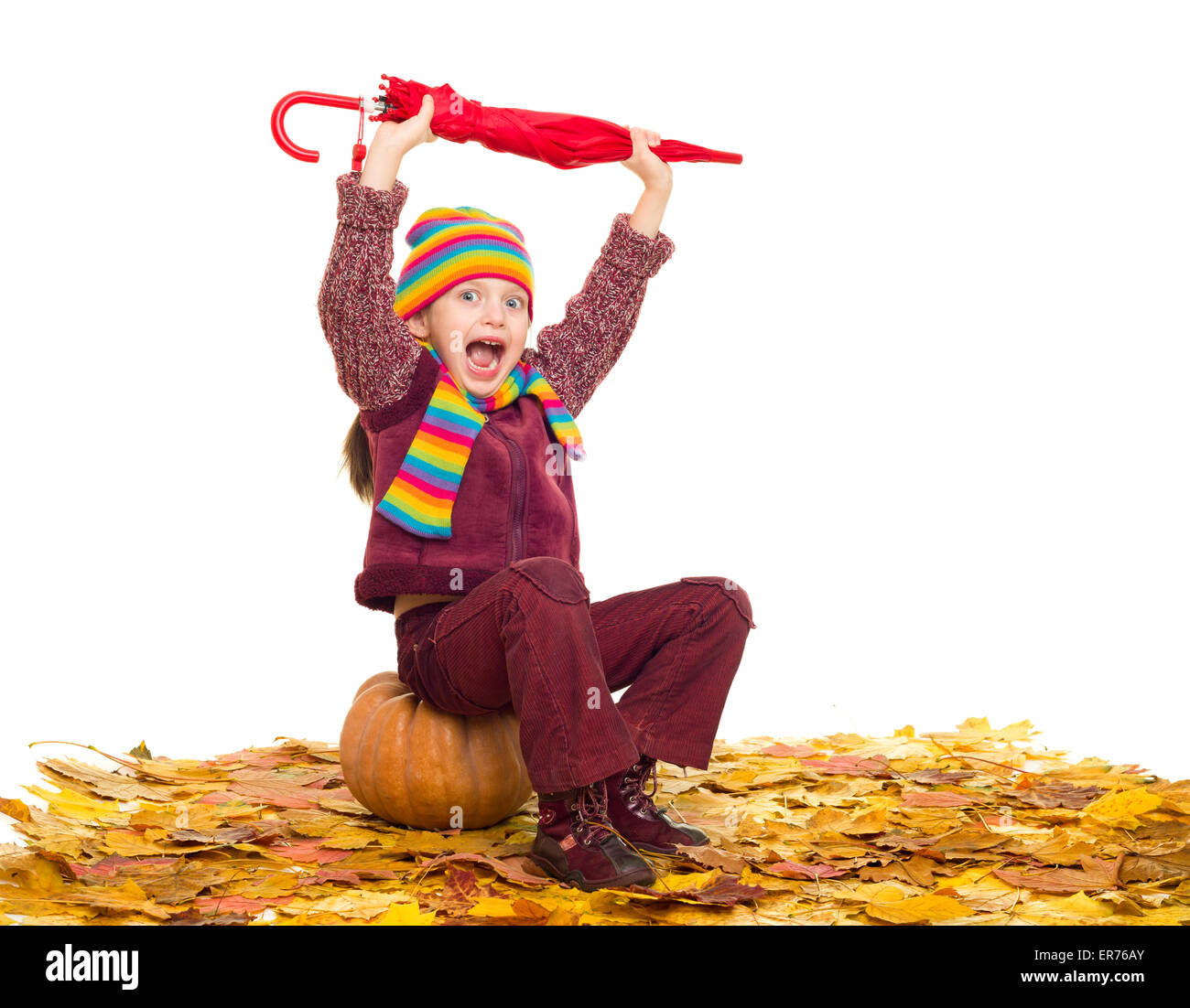 girl with umbrella on autumn leaves studio shoot Stock Photo - Alamy