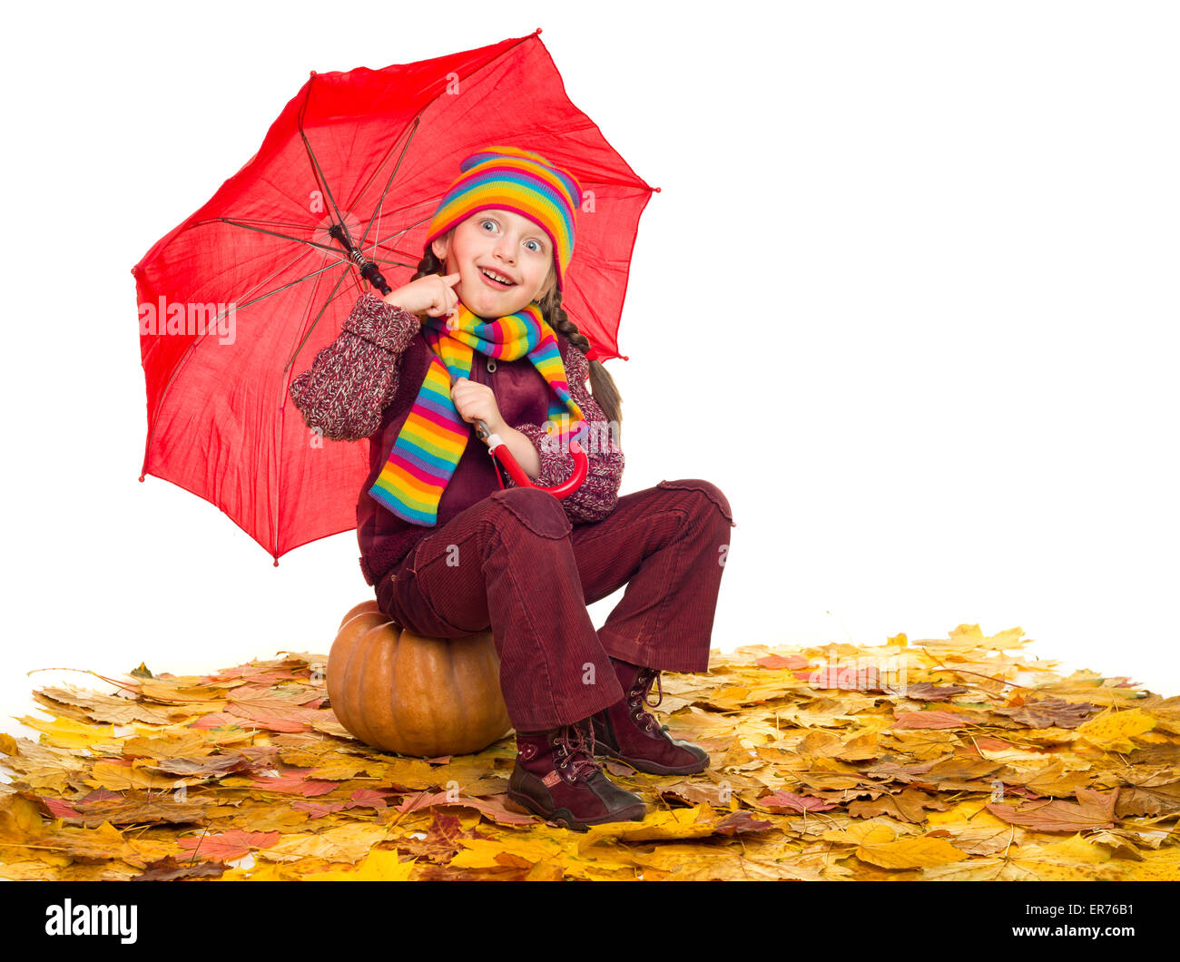 girl with umbrella on autumn leaves studio shoot Stock Photo - Alamy