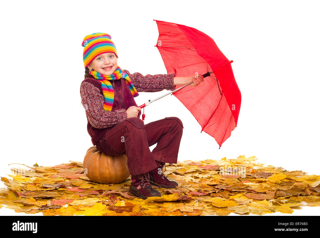 girl with umbrella on autumn leaves studio shoot Stock Photo - Alamy