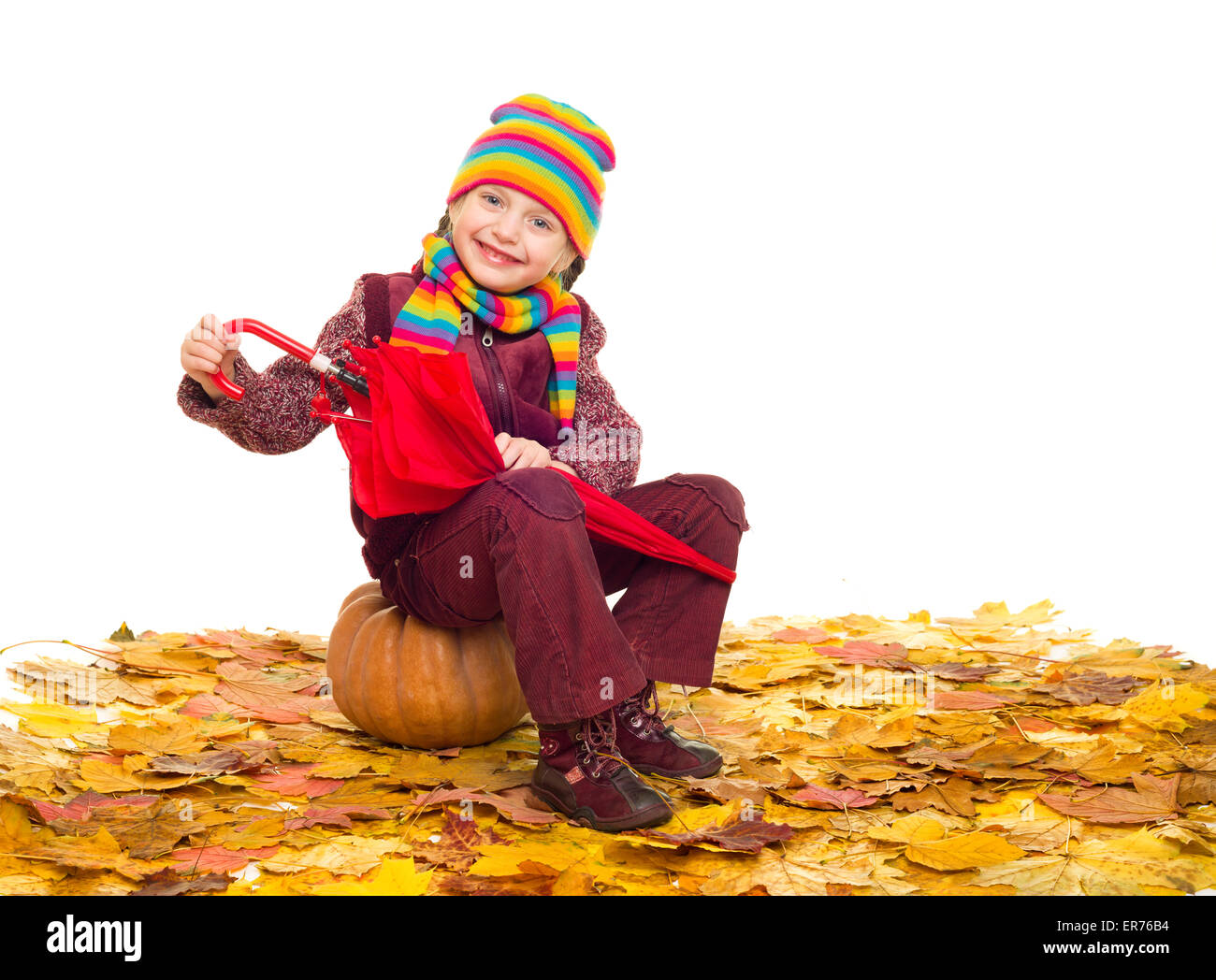girl with umbrella on autumn leaves studio shoot Stock Photo - Alamy