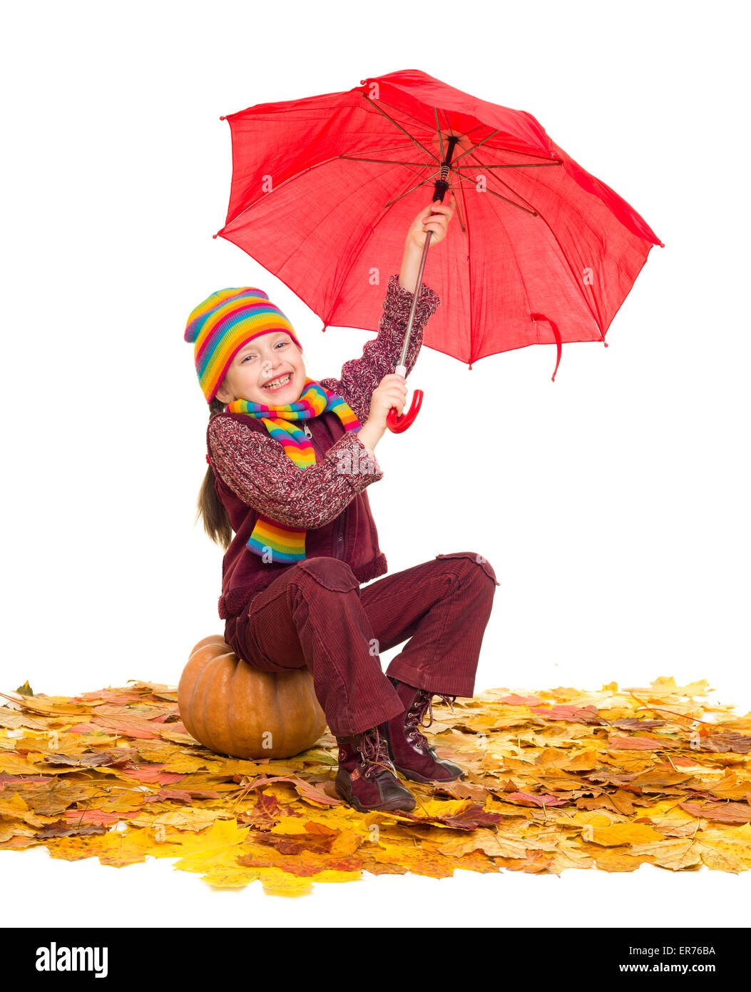 girl with umbrella on autumn leaves studio shoot Stock Photo - Alamy