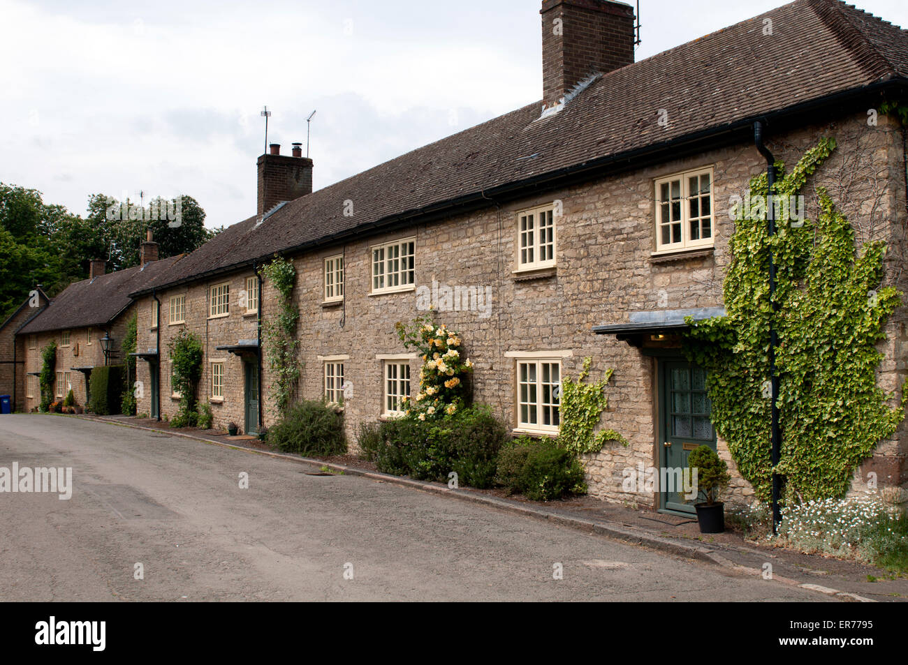 Cottages in Courteenhall village, Northamptonshire, England, UK Stock Photo