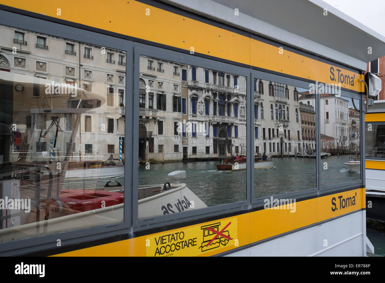 Vaporetto and water taxis on the Grand Canal in Venice Italy. Stock Photo