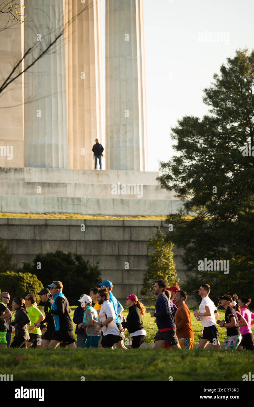 WASHINGTON DC, United States — Runners participate in the annual Cherry Blossom Ten Mile Run in Washington DC. The popular springtime race coincides with the National Cherry Blossom Festival, drawing thousands of competitors and spectators to the nation's capital. Stock Photo