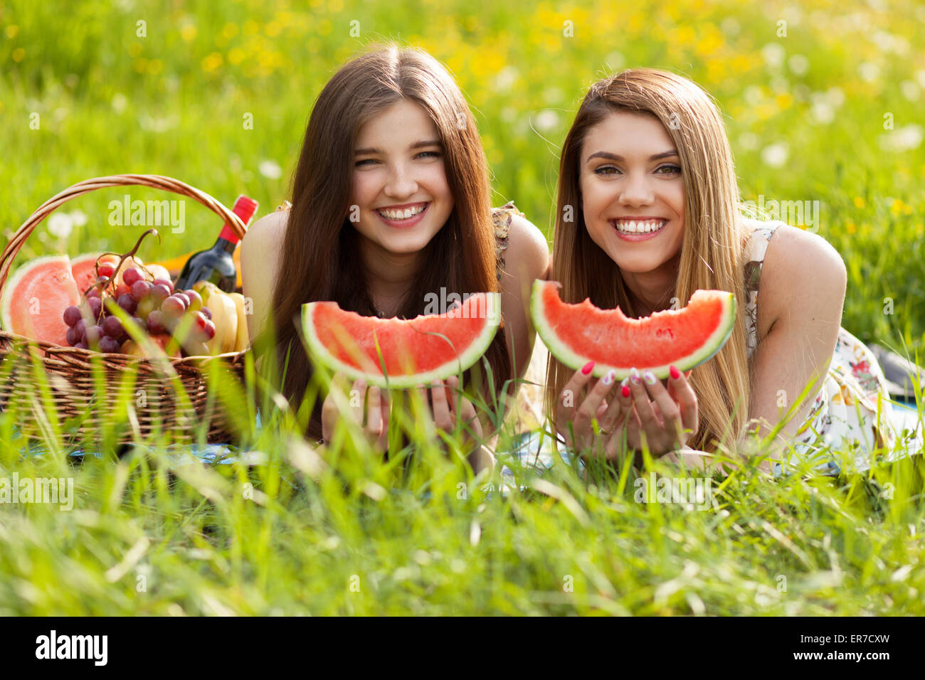 Two beautiful young women on a picnic Stock Photo