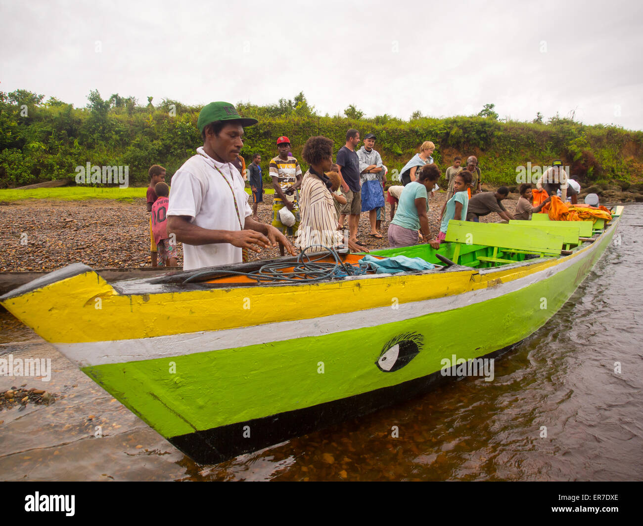 Man pulling boat out water hi-res stock photography and images - Alamy