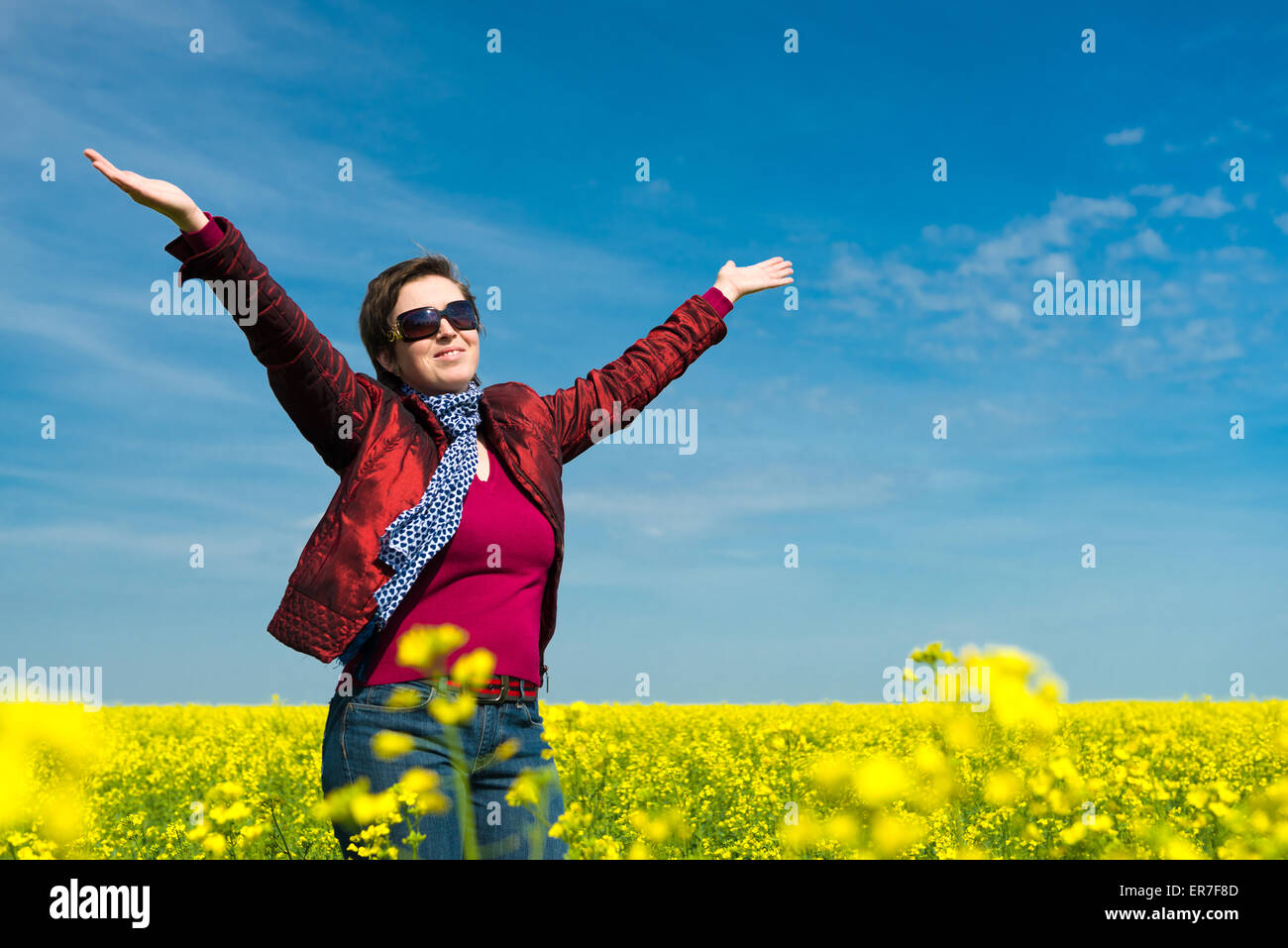 woman in a yellow field of rapeseed Stock Photo - Alamy