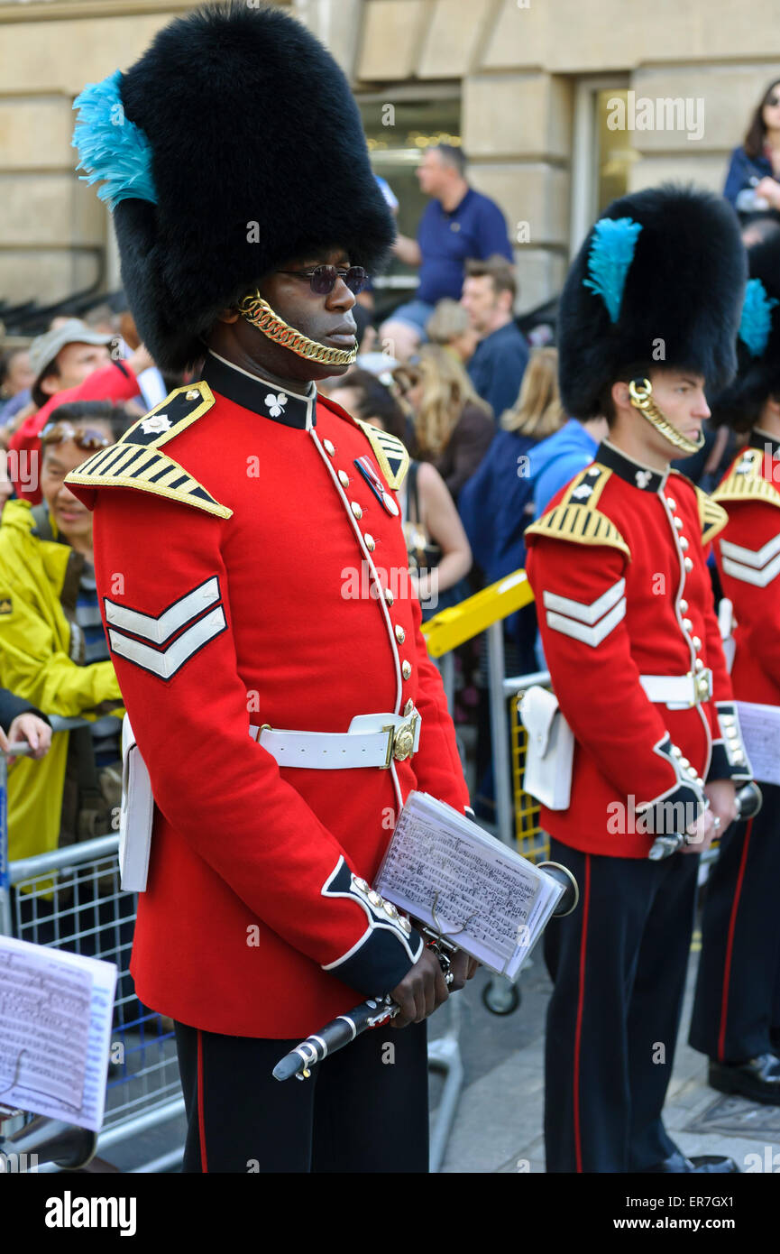 Members of the Queen's Guard band in red uniforms holding their musical  instruments and notes, London, England, United Kingdom Stock Photo - Alamy