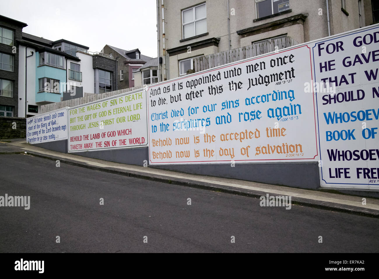 evangelical christian slogans on the wall of a house in northern ireland Stock Photo