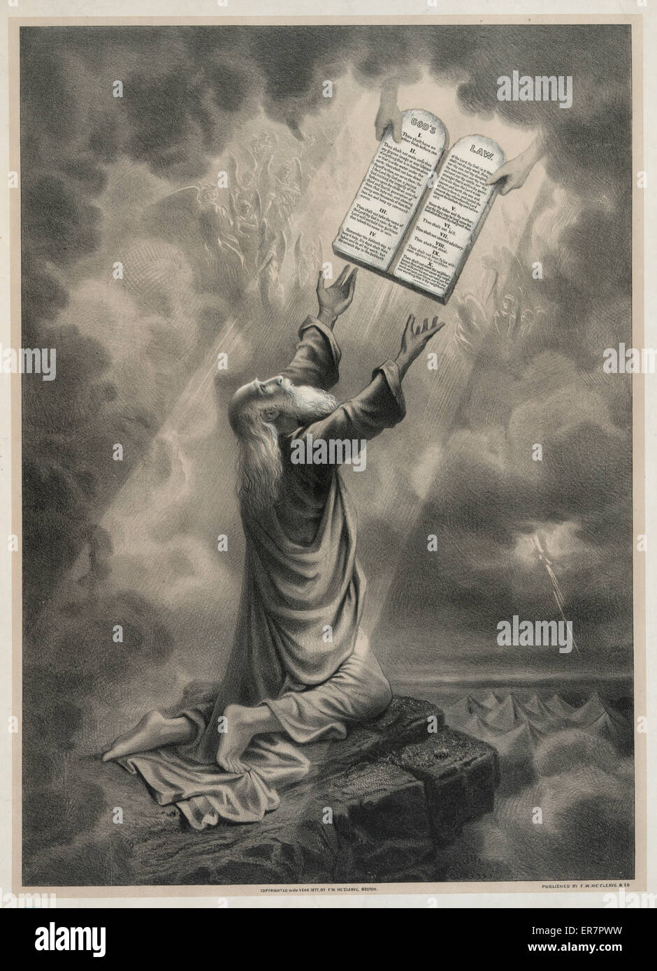 Moses receiveing the law. Print shows Moses kneeling and reaching upwards to accept the tablets inscribed with theTen Commandments from the hands of God. Angels can be seen in the heaven. Date c1877. Stock Photo