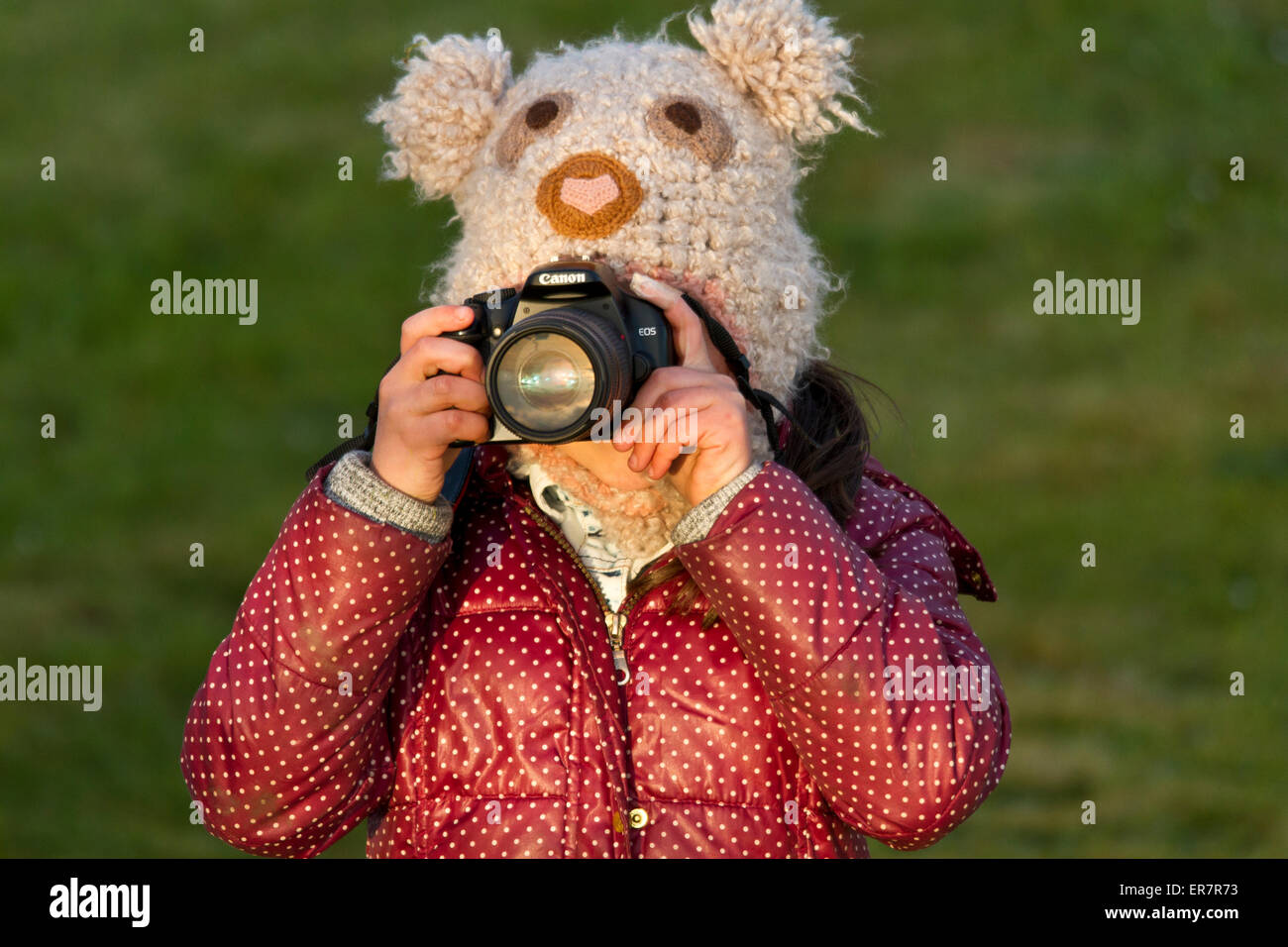 Young girl with camera Stock Photo