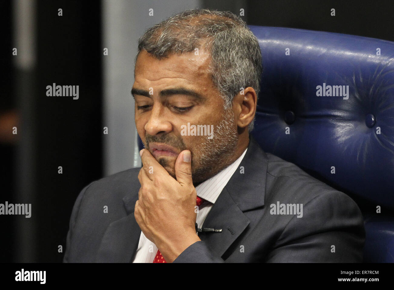 Brasilia, Brazil. 28th May, 2015. The senator and former Brazilian player Romario reacts during a plenary session of the Senate in Brasilia, Brazil, on May 28, 2015. The Brazilian Senate on Thursday approved the request made by former soccer star and now Senator Romario for the creation of a congressional panel to investigate corruption in soccer. Credit:  Dida Sampaio/AGENCIA ESTADO/Xinhua/Alamy Live News Stock Photo