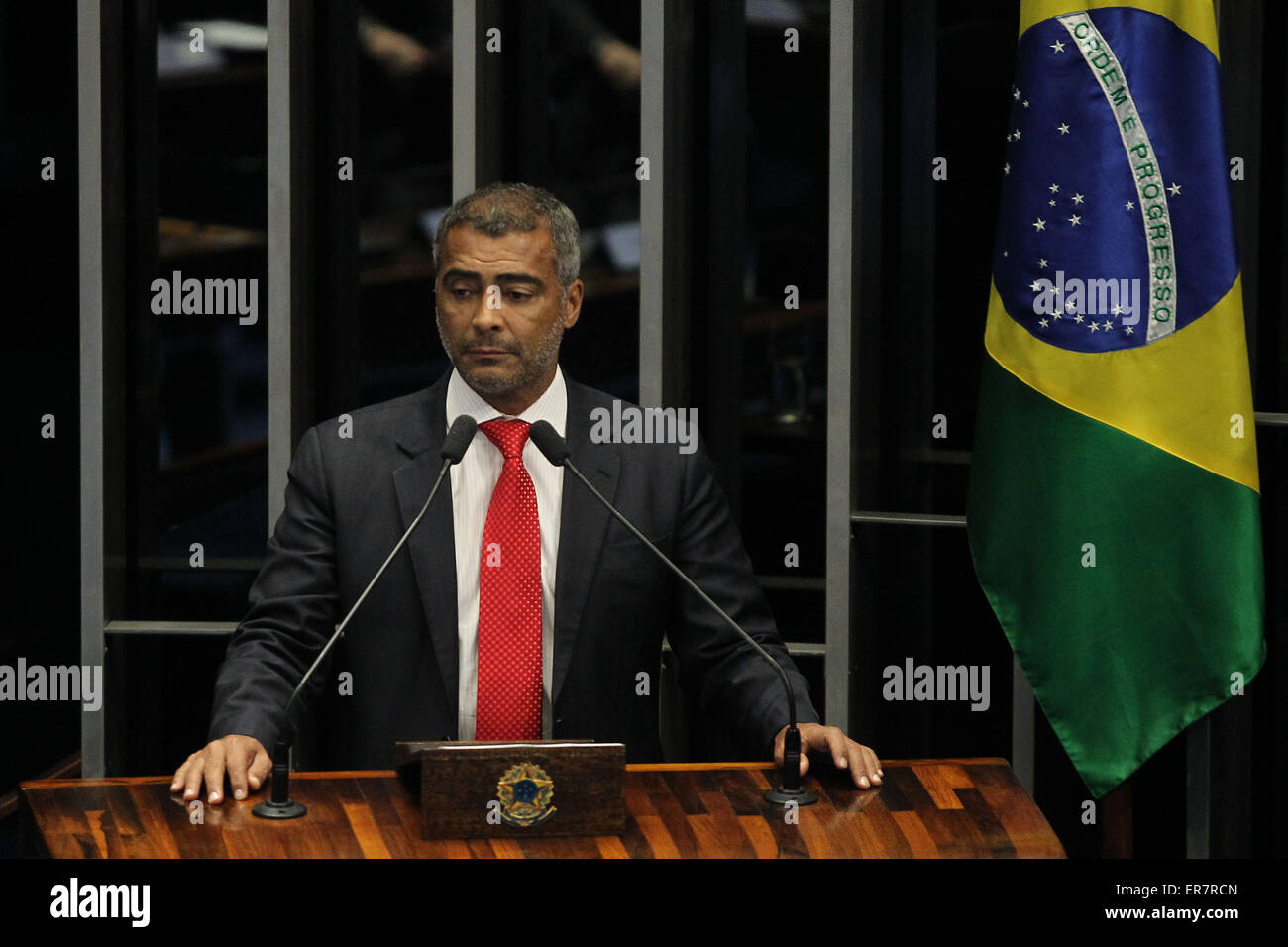 Brasilia, Brazil. 28th May, 2015. The senator and former Brazilian player Romario takes part in a plenary session of the Senate in Brasilia, Brazil, on May 28, 2015. The Brazilian Senate on Thursday approved the request made by former soccer star and now Senator Romario for the creation of a congressional panel to investigate corruption in soccer. Credit:  Dida Sampaio/AGENCIA ESTADO/Xinhua/Alamy Live News Stock Photo