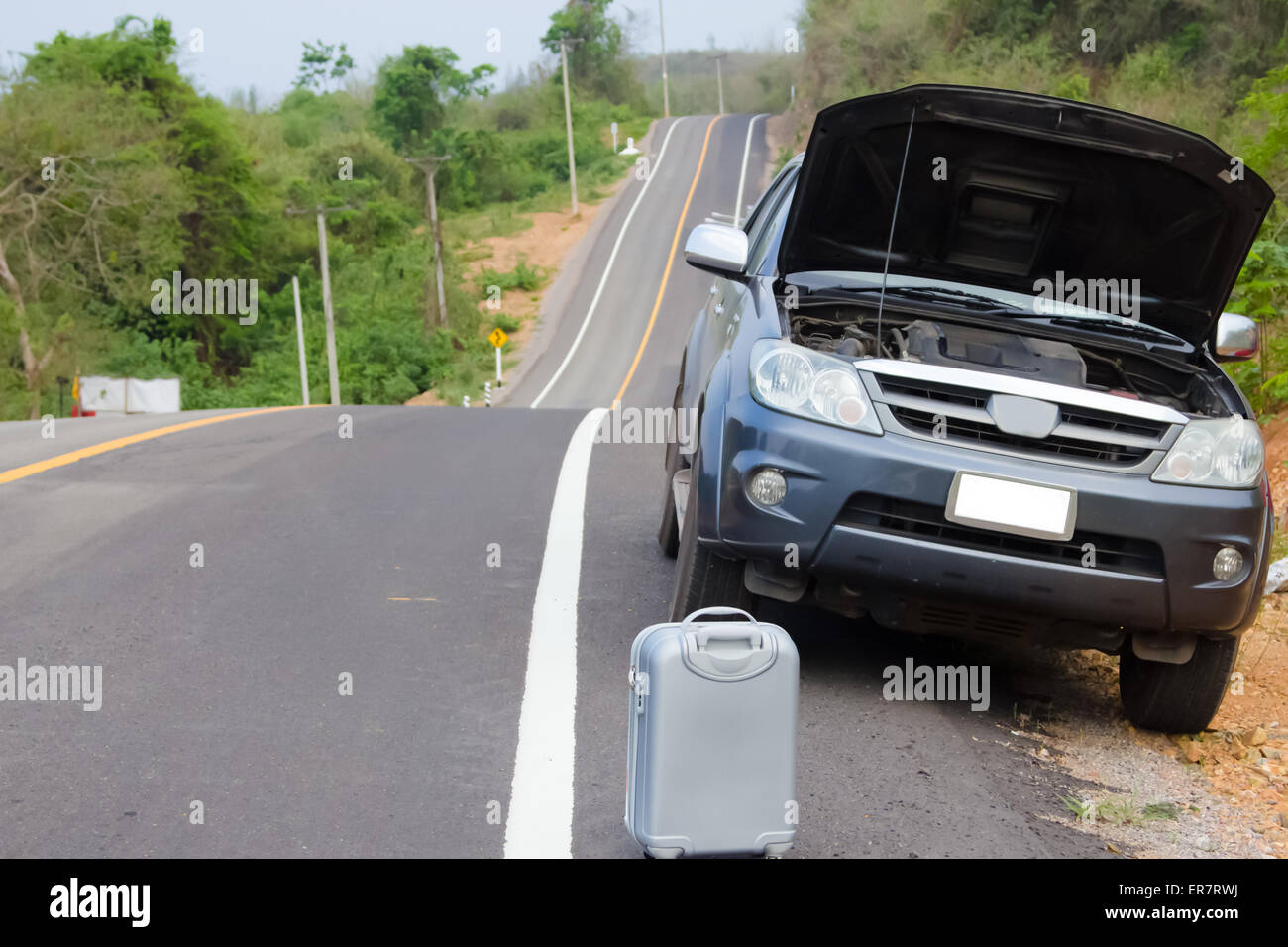 Broken down car on the side of a road Stock Photo Alamy