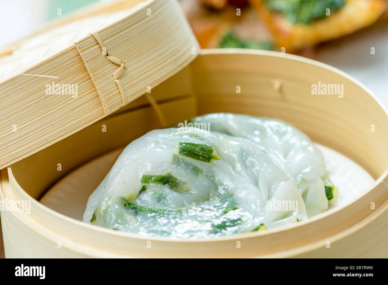 Chinese vegetable dumplings in bamboo steamer Stock Photo Alamy