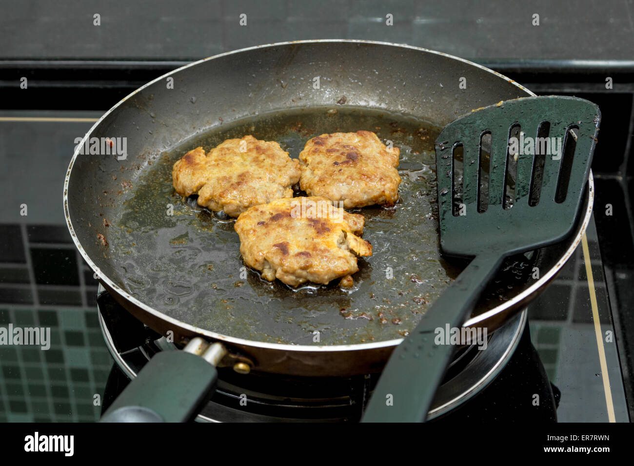 grill burger in pan Stock Photo Alamy