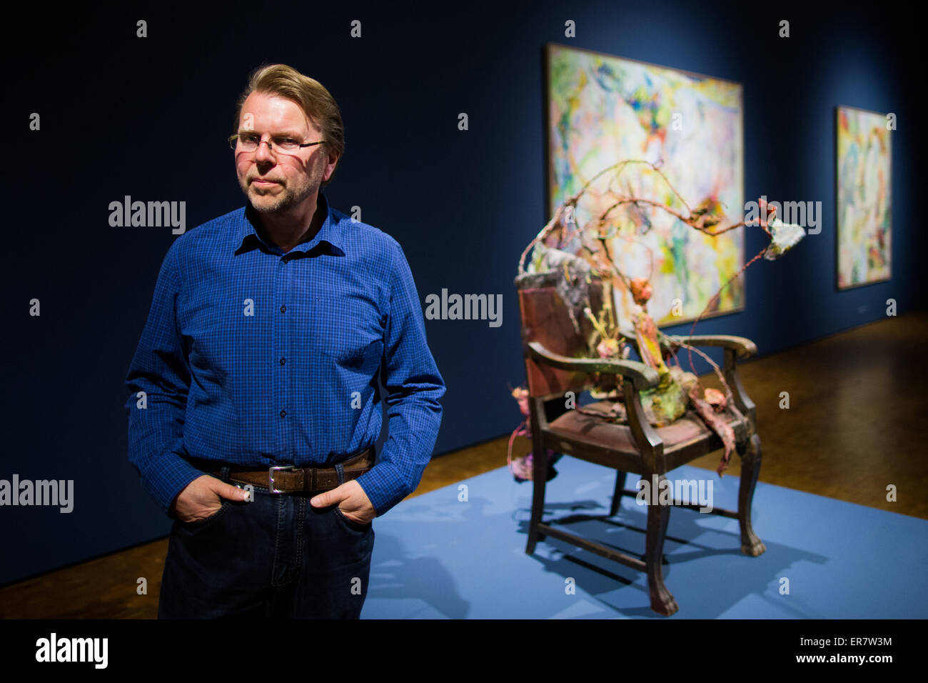 Cologne, Germany. 28th May, 2015. Curator Stephan Diederich stands in the exhibition 'Bernard Schultze - A Centennial Exhibition' in the Museum Ludwig in Cologne, Germany, 28 May 2015. Photo: ROLF VENNENBERND/dpa/Alamy Live News Stock Photo