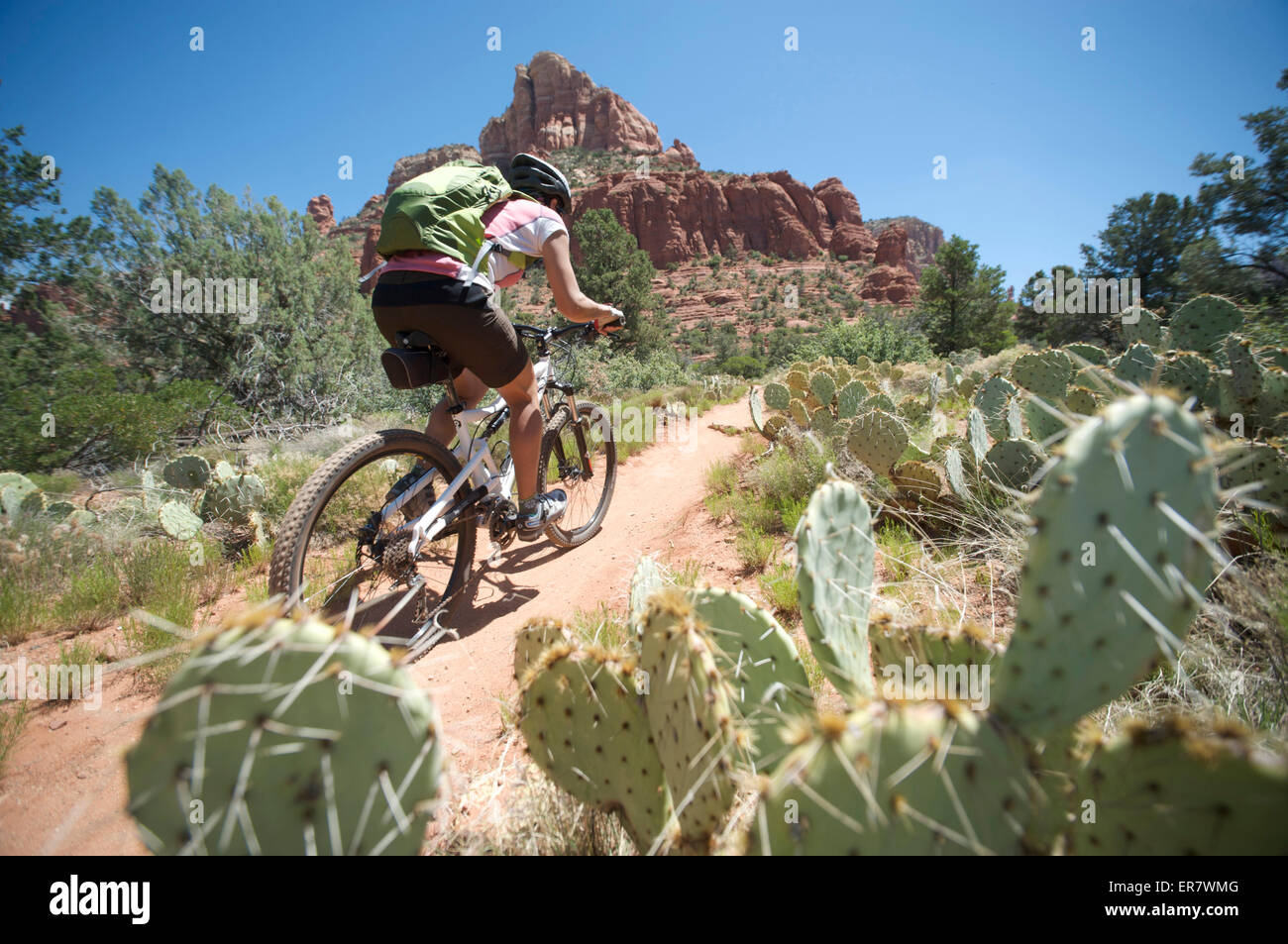 Woman rides the Submarine Rock Loop in South Sedona, Arizona Stock ...
