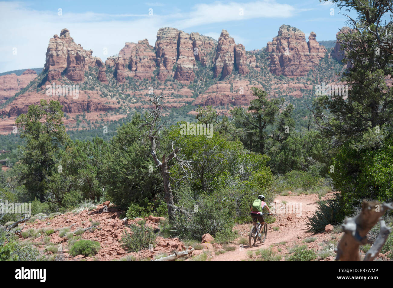 Woman rides the Submarine Rock Loop in South Sedona, Arizona Stock ...
