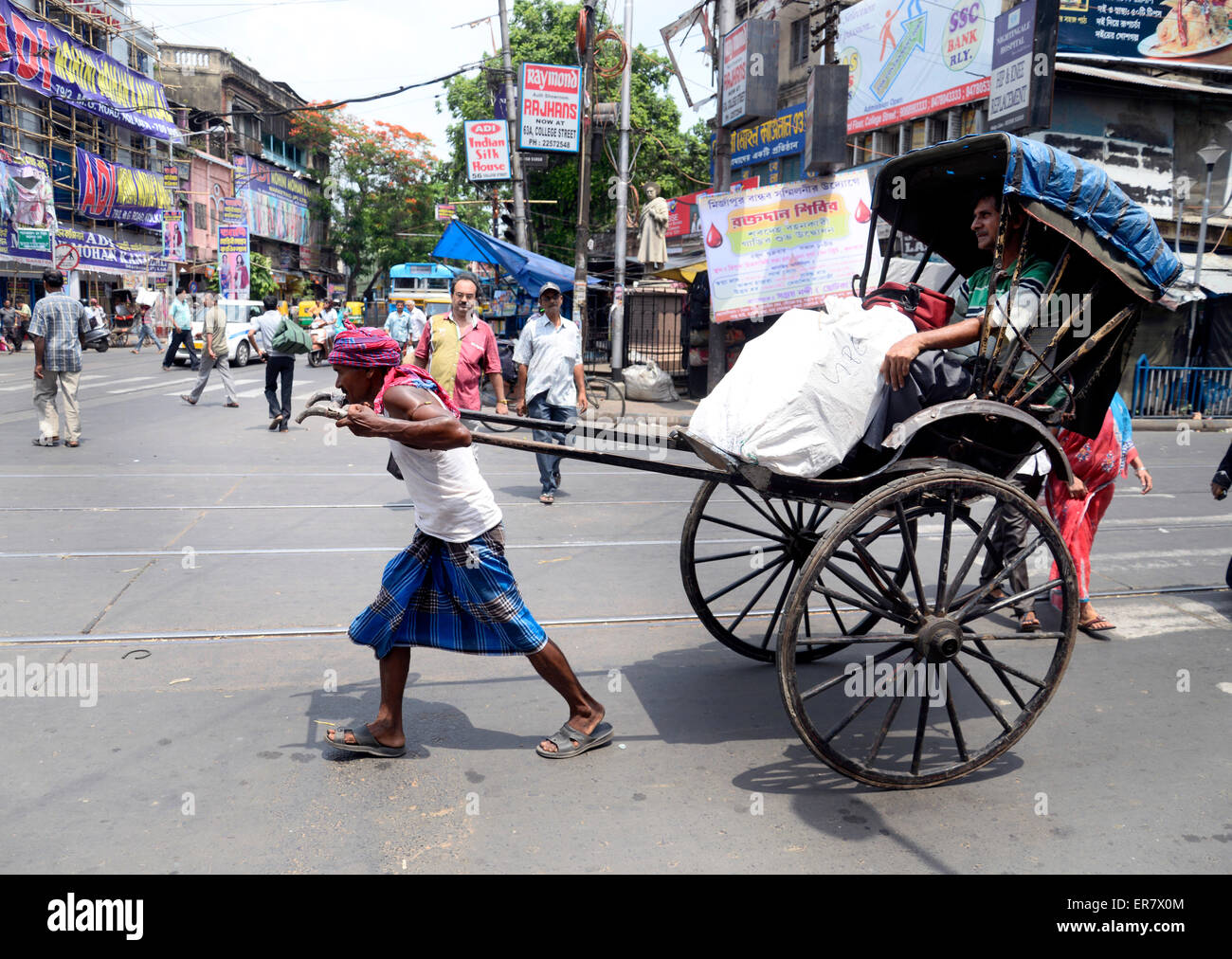 Hand pulling rickshaw puller pulling hires stock photography and images Alamy
